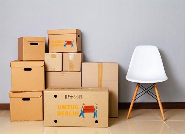 moving-boxes-with-packed-stuff-and-chair-for-movin-1