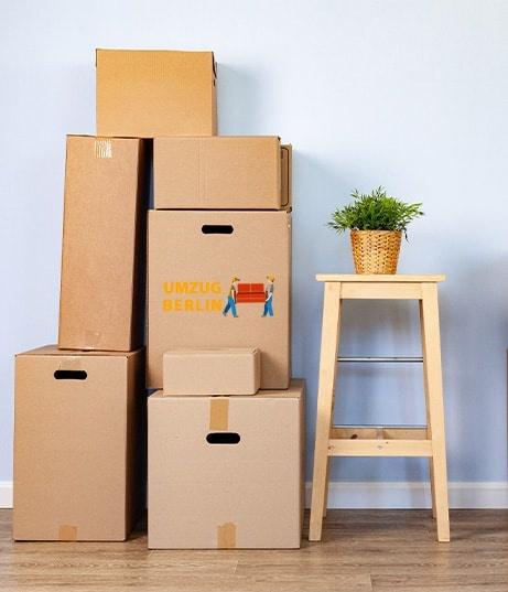 moving-boxes-with-packed-stuff-and-chair-for-movin