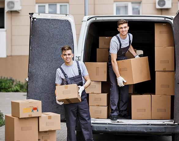 two-young-handsome-smiling-movers-wearing